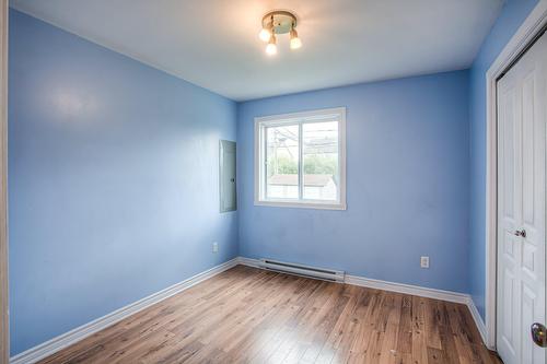 Chambre à coucher - 4658 Rue Esther-Pariseau, Laval (Chomedey), QC - Indoor Photo Showing Other Room