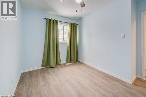 Empty room featuring light wood-type flooring and ceiling fan - 33 Garland Crescent, London, ON - Indoor Photo Showing Other Room