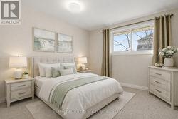 AI staged 2nd Bedroom. Only Furniture added - 