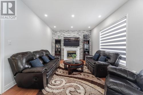 4 Runnymede Crescent, Brampton, ON - Indoor Photo Showing Living Room With Fireplace