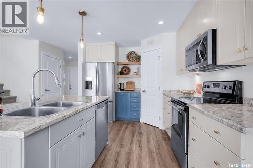 1059 Kolynchuk Crescent, Saskatoon, SK - Indoor Photo Showing Kitchen With Stainless Steel Kitchen With Double Sink With Upgraded Kitchen