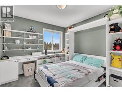 Bed 1 upstairs with murphy bed and built in shelving - 