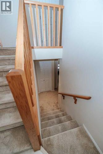 Stairs to Basement - 54 Kodiak Crescent N, Lethbridge, AB - Indoor Photo Showing Other Room