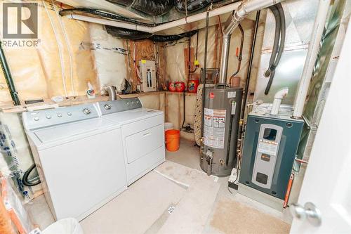Basement- Laundry & Furnace - 54 Kodiak Crescent N, Lethbridge, AB - Indoor Photo Showing Basement
