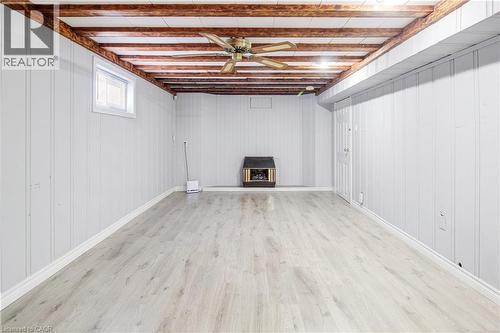 Basement featuring light wood-style floors and a ceiling fan - 773 Queensdale Avenue E, Hamilton, ON - Indoor Photo Showing Basement