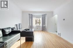 Office area featuring light wood-type flooring and baseboards - 