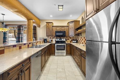 M1-A-1351 Gerry Sorensen Way, Kimberley, BC - Indoor Photo Showing Kitchen With Double Sink
