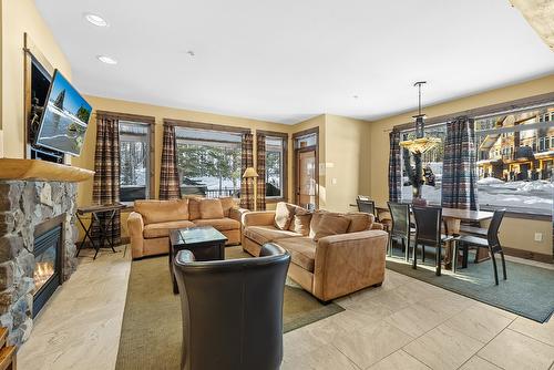 M1-A-1351 Gerry Sorensen Way, Kimberley, BC - Indoor Photo Showing Living Room With Fireplace