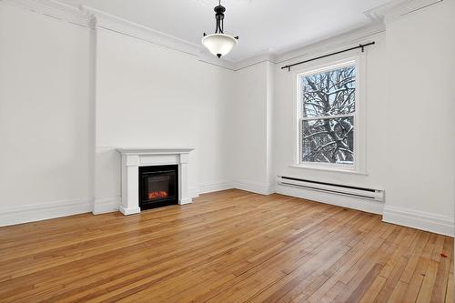 Living room - 2324 Av. Belgrave, Montréal (Côte-Des-Neiges/Notre-Dame-De-Grâce), QC - Indoor Photo Showing Living Room With Fireplace