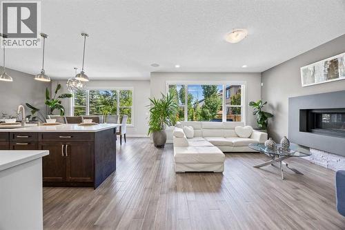 144 Legacy Mount Se, Calgary, AB - Indoor Photo Showing Other Room With Fireplace