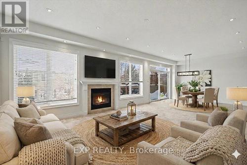 93 Tremaine Drive, Kitchener, ON - Indoor Photo Showing Living Room With Fireplace