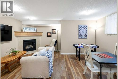 37 Silverado Saddle Avenue Sw, Calgary, AB - Indoor With Fireplace