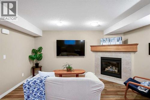37 Silverado Saddle Avenue Sw, Calgary, AB - Indoor With Fireplace