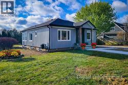 View of front of house featuring roof with shingles - 