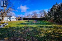 View of yard featuring an outbuilding - 