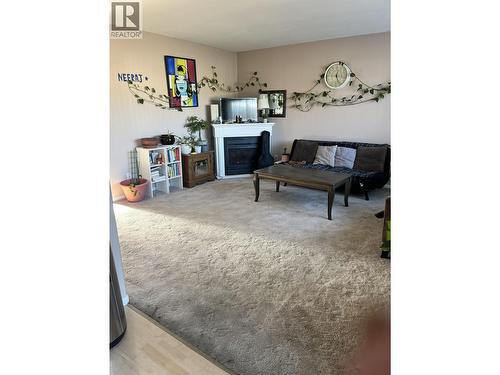 4 4737 Walsh Avenue, Terrace, BC - Indoor With Fireplace
