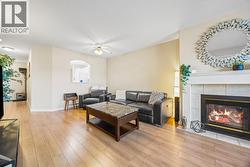 Open Concept Living Room With Gas Fireplace - 