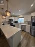 104 Westfield Road, Saskatoon, SK  - Indoor Photo Showing Kitchen With Stainless Steel Kitchen With Double Sink 