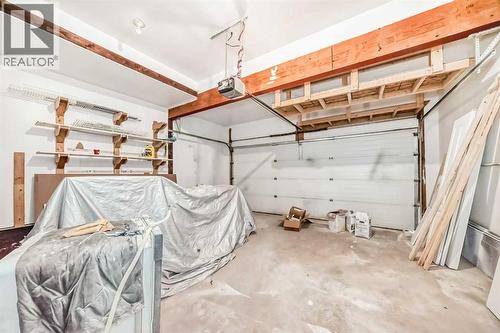 936 Cranston Drive Se, Calgary, AB - Indoor Photo Showing Garage