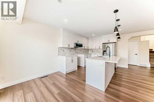 936 Cranston Drive Se, Calgary, AB - Indoor Photo Showing Kitchen