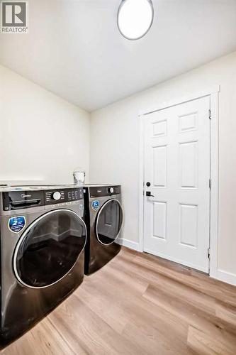 936 Cranston Drive Se, Calgary, AB - Indoor Photo Showing Laundry Room