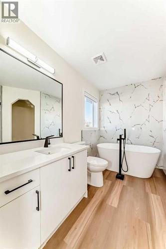 936 Cranston Drive Se, Calgary, AB - Indoor Photo Showing Bathroom