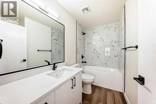 936 Cranston Drive Se, Calgary, AB - Indoor Photo Showing Bathroom
