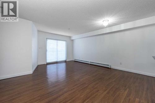 217, 7130 80 Avenue Ne, Calgary, AB - Indoor Photo Showing Other Room