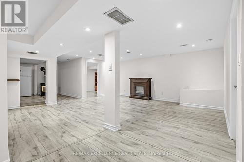 45 Stevenson Road N, Oshawa, ON - Indoor Photo Showing Other Room With Fireplace