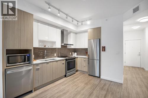 Spacious, functional kitchen - 1775 Chapman Place Unit# Ph12, Kelowna, BC - Indoor Photo Showing Kitchen With Stainless Steel Kitchen With Double Sink