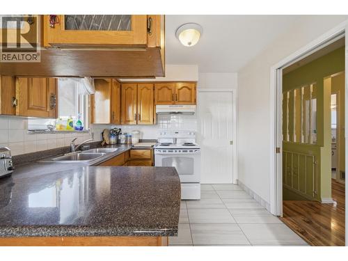 154 E 64Th Avenue, Vancouver, BC - Indoor Photo Showing Kitchen With Double Sink