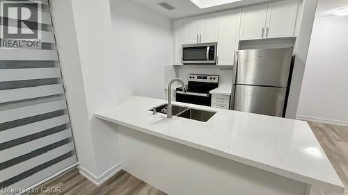 470 Dundas Street E Unit# 1009, Waterdown, ON - Indoor Photo Showing Kitchen With Stainless Steel Kitchen With Upgraded Kitchen