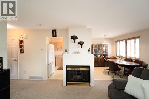 2401 12Th Street N Unit# 20, Cranbrook, BC - Indoor Photo Showing Living Room With Fireplace
