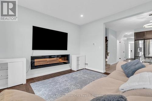7 - 269 Watson Parkway N, Guelph (Grange Road), ON - Indoor Photo Showing Living Room With Fireplace