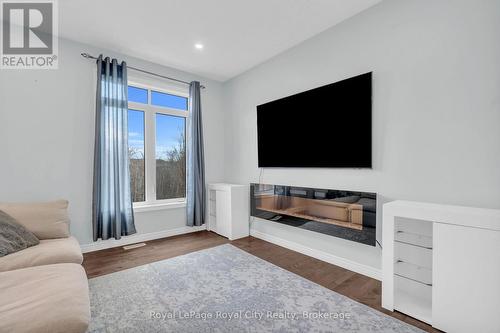 7 - 269 Watson Parkway N, Guelph (Grange Road), ON - Indoor Photo Showing Living Room With Fireplace