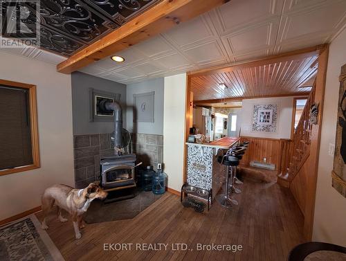 Dining to Kitchen and Front Entrance/Guest/Bath - 460 - 5427 Young Street, Hamilton Township, ON - Indoor With Fireplace