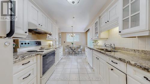 18 Brenham Crescent, Toronto, ON - Indoor Photo Showing Kitchen With Double Sink