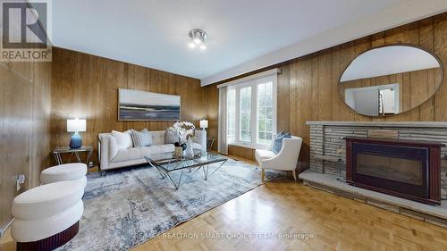 18 Brenham Crescent, Toronto, ON - Indoor Photo Showing Living Room With Fireplace