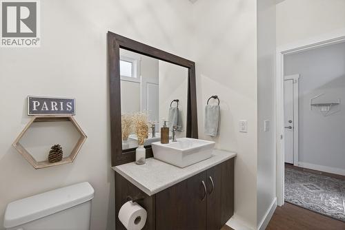 Powder Room on the Main Level - 2893 Robinson Road Unit# 5, Lake Country, BC - Indoor Photo Showing Other Room
