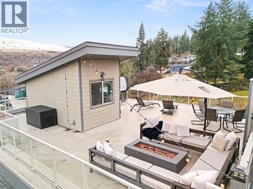 Private Rooftop Patio Offering Lake Views and Ideal Entertaining Space - 2893 Robinson Road Unit# 5, Lake Country, BC - Outdoor With Exterior