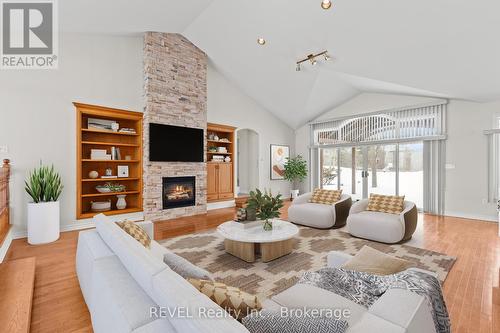 virtually staged - 2765 Niagara Parkway, Fort Erie (Black Creek), ON - Indoor Photo Showing Living Room With Fireplace