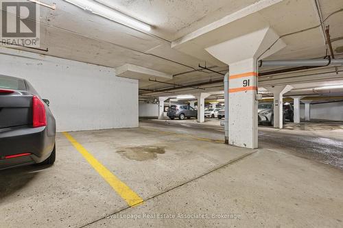 One Parking Spot - 1004 - 10 Malta Avenue, Brampton, ON - Indoor Photo Showing Garage
