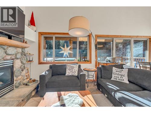 1271 Apex Mountain Road Unit# 306, Penticton, BC - Indoor Photo Showing Living Room With Fireplace