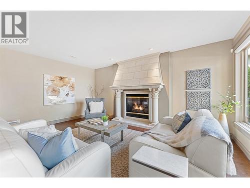 660 Almandine Court, Kelowna, BC - Indoor Photo Showing Living Room With Fireplace