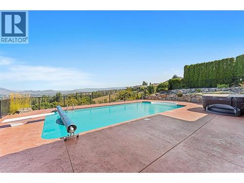 660 Almandine Court, Kelowna, BC - Outdoor With In Ground Pool