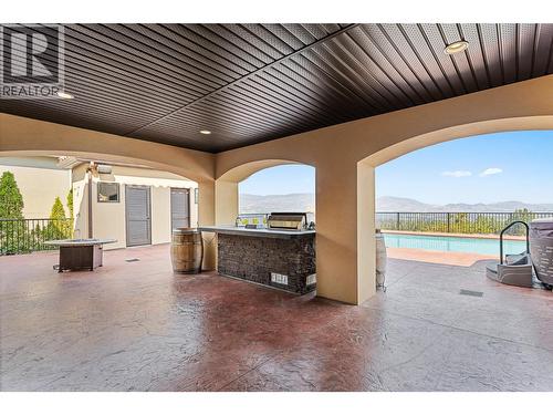 660 Almandine Court, Kelowna, BC - Outdoor With In Ground Pool With Deck Patio Veranda With Exterior