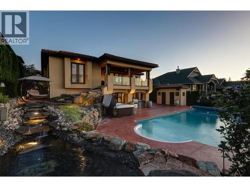 660 Almandine Court, Kelowna, BC - Outdoor With In Ground Pool