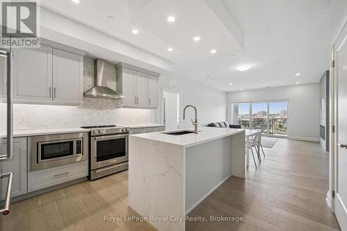 1007 - 71 Wyndham Street S, Guelph (St. Patrick'S Ward), ON - Indoor Photo Showing Kitchen With Upgraded Kitchen