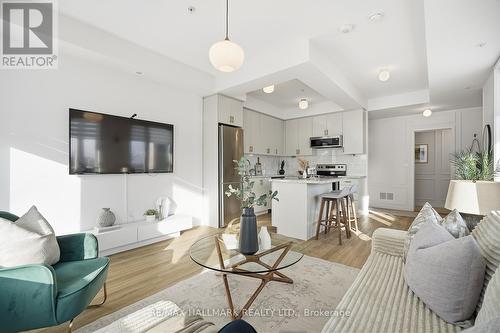 101 - 1711 Pure Springs Boulevard, Pickering, ON - Indoor Photo Showing Living Room