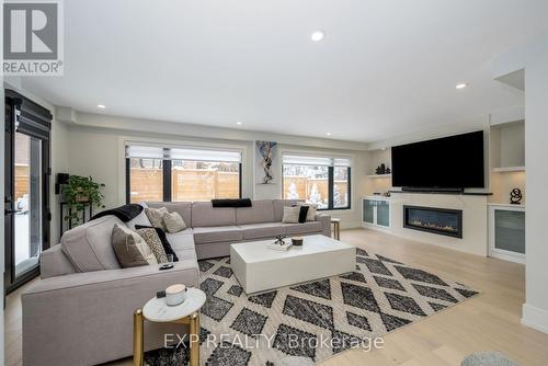 1279 Winterbourne Drive, Oakville, ON - Indoor Photo Showing Living Room With Fireplace